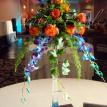 Wedding reception-Tall centerpiece:Eiffel tower vase with roses and orchids